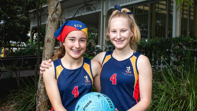 Year 12 Athletics Co-Captain Keely Whittaker poses with Year 7 student and member of the St Hilda's Ball Games team Jessica Jolly ahead of the QGSSSA annual meet. Photo: Daniel Snare