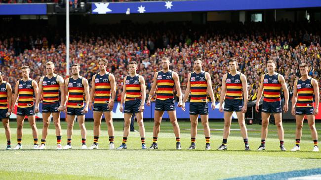 Adelaide performs its infamous ‘power stance’ before the 2017 grand final against Richmond. Picture: Darrian Traynor/AFL Media/Getty Images