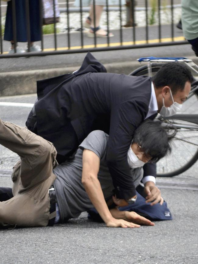 A man, believed to be a suspect shooting Japanese Prime Minister Shinzo Abe at Yamato Saidaiji Station.