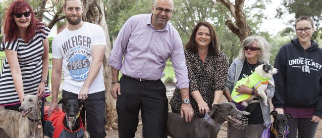 Mayor Khal Asfour, third from left, with Meg Simmons (with Rosie), Noel Rayner (Usher), Rohan Jarvis  (Griffin), Sharyn Lee (Henry) and Erin Lecky (George) at Close St Reserve. 