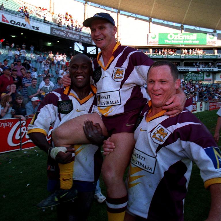 Broncos players celebrate their win at SFS.