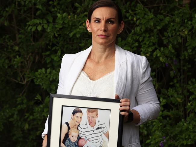 ATTN DO NOT RUN BEFORE July 23Ã.. Sonya Leeding holds a photo of her late husband, Detective Senior Constable Damian Leeding, It's for a story, running July 23, looking at the fact just over half of Australian families are saying ÃyesÃ to their loved ones becoming organ donors when asked. Sonya consented to her Damian becoming an organ donor and he was able to donate both kidneys.