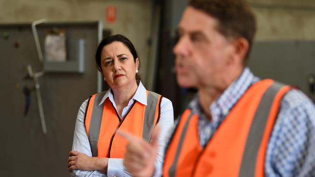 Premier Annastacia Palaszczuk listens to Treasurer Cameron Dick on a campaign visit in Mackay. Picture: NCA NewsWire / Dan Peled