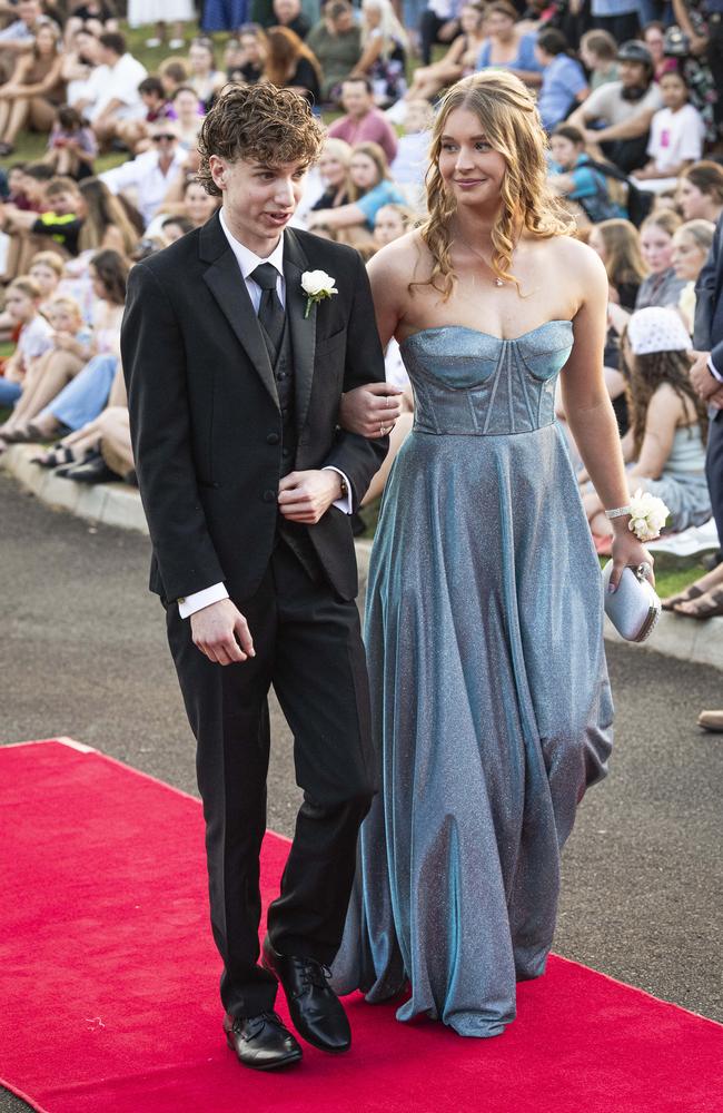 Graduates Riley Cuthbert and Nicolene Snyman arrive at Mary MacKillop Catholic College formal at Highfields Cultural Centre, Thursday, November 14, 2024. Picture: Kevin Farmer