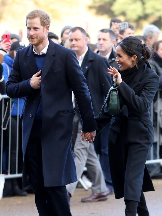 Prince Harry and his fiancee Meghan Markle are seen during a walkabout at Cardiff Castle on January 18, 2018 in Cardiff, Wales. Picture: Getty