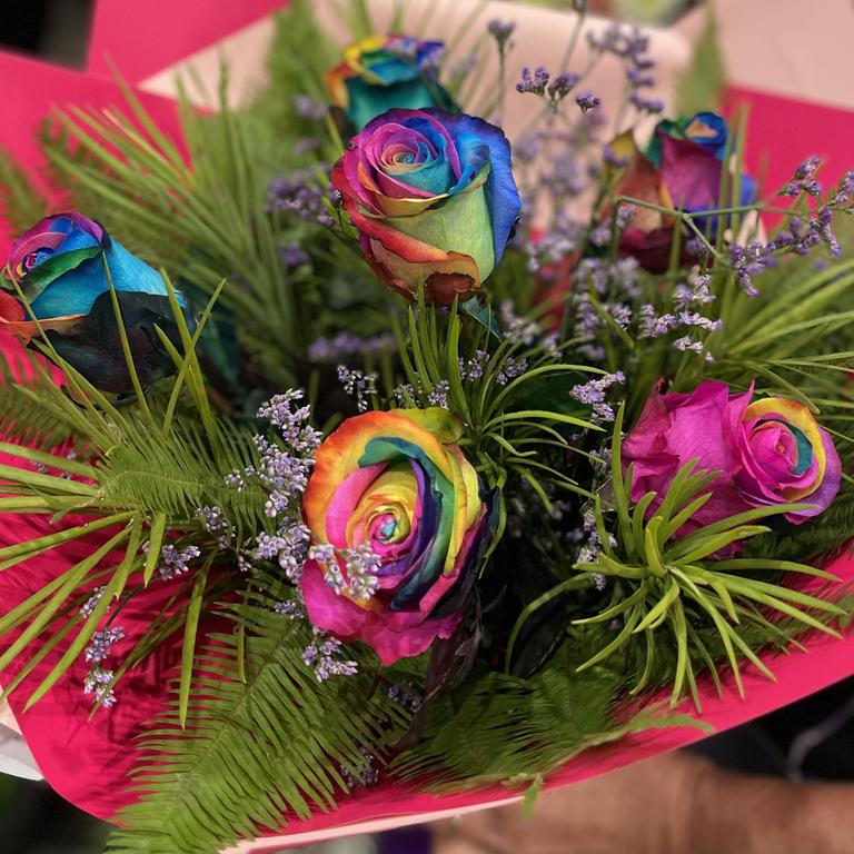 Lovely Valentine's Day bouquet with rainbow roses from M's Enchanted Flowers. Picture: Janessa Ekert