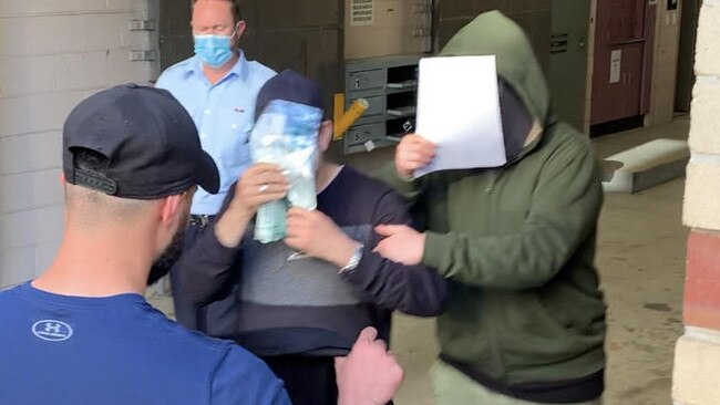 Ali Hindawy, 18, from Auburn, fronted Burwood Local Court on Wednesday wearing a green hoodie and showed no emotion as he sat in the dock.