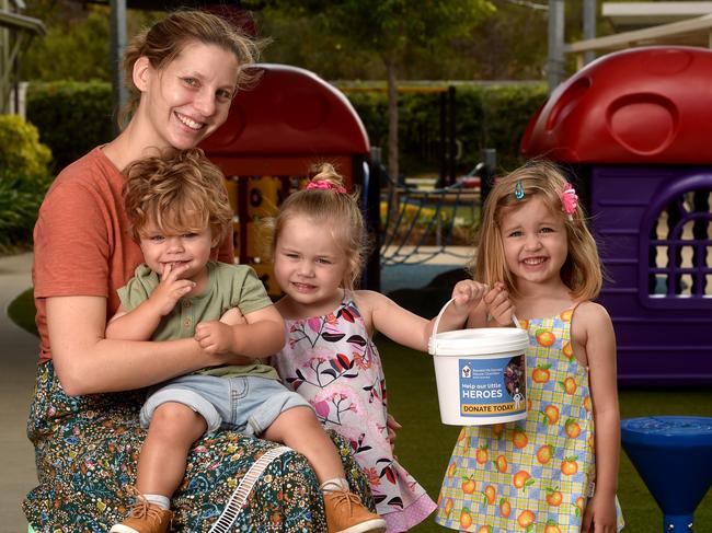 Erin Townley from Mackay with Logan, 2, Allie, 3, and Mia, 4, at the Ronald McDonald House at the University Townsville Hospital. Picture: Evan Morgan