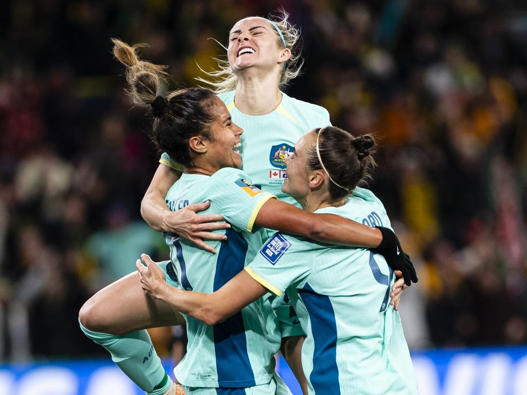 World Cup goal joy: Mary Fowler of Australia (L) celebrating her goal with teammates Ellie Carpenter (C) and Caitlin Foord. Picture: Richard Callis/Eurasia Sport Images/Getty Images