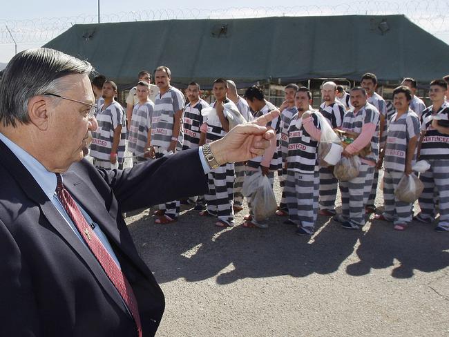 In this 2009 photo, Arpaio orders approximately 200 convicted illegal immigrants handcuffed together and moved into a separate area of Tent City. Picture: Ross D. Franklin/AP