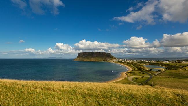 The picturesque town of Stanley at the base of The Nut in the state’s North-West. Photo: FILE