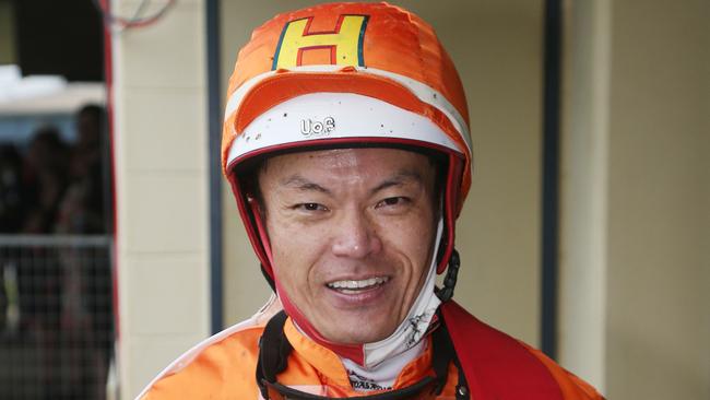 Masayuki Abe narrowly edged out Sylvester to win Race 3 riding War General at the Banana Industry Race Day, held at the Innisfail Turf Club. Picture: Brendan Radke
