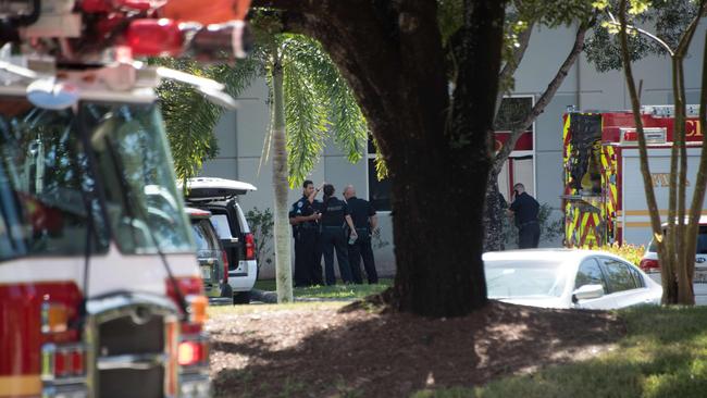 Police and firefighters arrive outside the offices of Democratic Congresswoman Debbie Wasserman Schultz after a suspicious package was found. Picture: AFP.