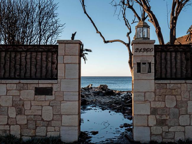 The ocean is visible from the entrance to a home destroyed by the Palisades wildfire on January 13, 2025 in Malibu, California. Picture: Getty Images via AFP