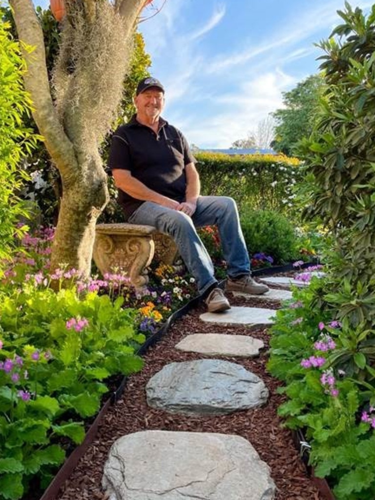 First time Chronicle Garden Competition entrant, Michael Glennon, seated in his inner city Mount Lofty front garden.