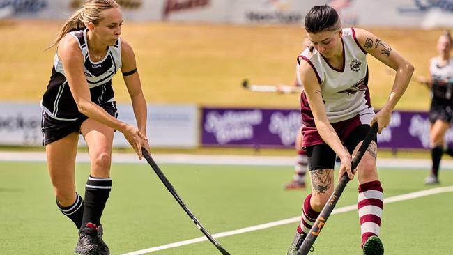 Adelaide University’s Blaine Otway (L) battles Grange’s Trinity Schmidt during their Hockey SA Premier League clash on Sunday. Picture: Matt Loxton