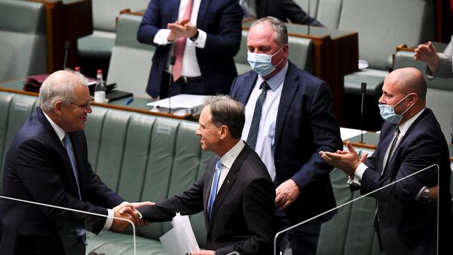 Health Minister Greg Hunt is congratulated by Scott Morrison after he delivered his valedictory speech in parliament on Thursday. Picture: AAP