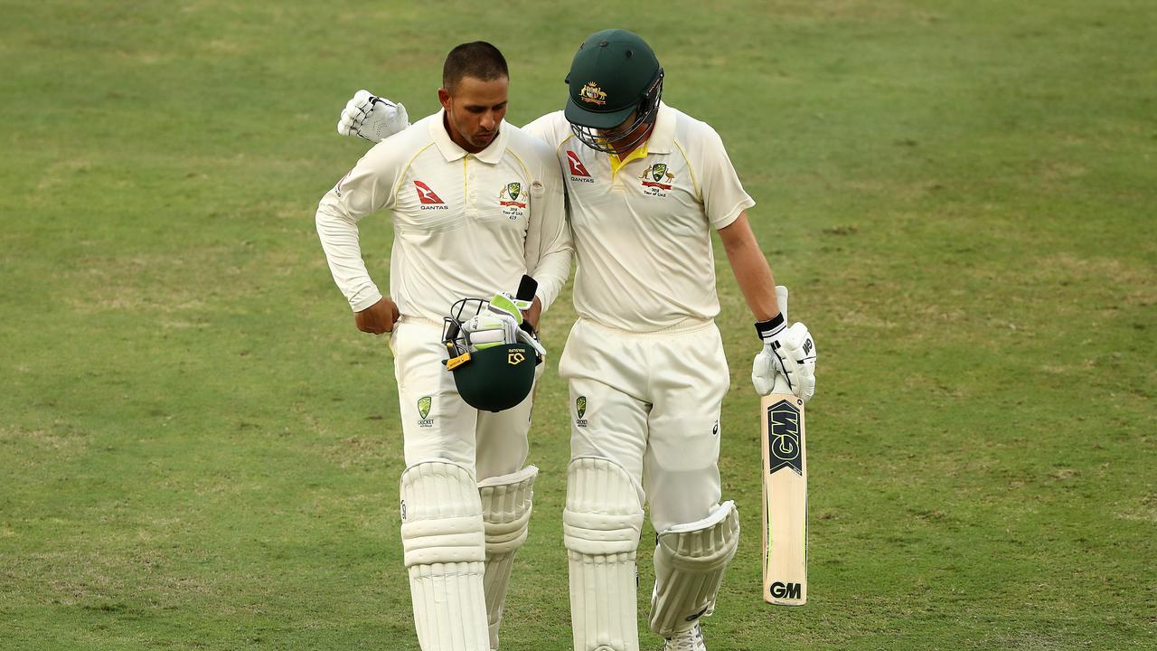 Travis Head and Usman Khawaja guided Australia to 3-136 at stumps on day four.