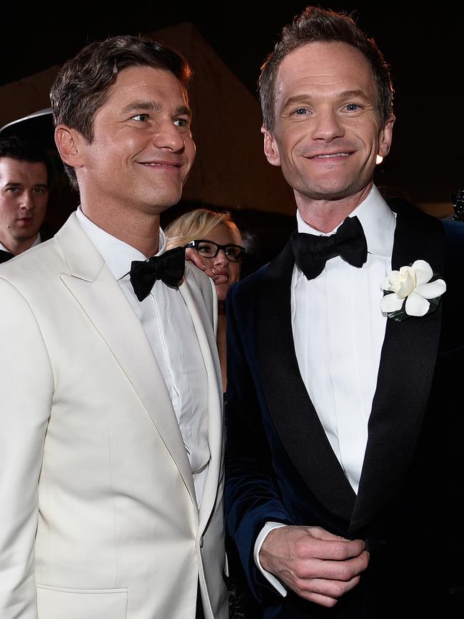 Actor David Burtka (L) and Oscars host Neil Patrick Harris hit the red carpet at the 87th Annual Academy Awards Governors Ball. Picture: Getty