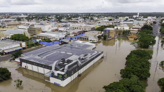 Flooding in Maryborough with Woolworths supermarket in the foreground. Picture: John Wilson