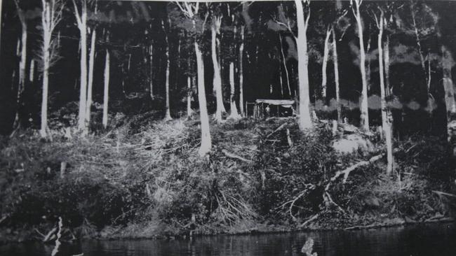 Len Hagart standing in front of his hut at Hill 60 on the Russell River, sometime between 1928 and 1930, from the book Around the Cassowary Rock. Picture: Supplied