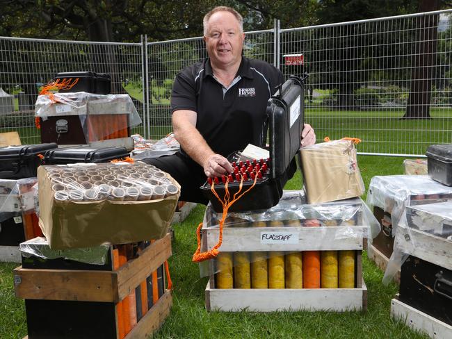 Howard & Sons pyrotechnician Rusty Johnson with some of the fireworks that will make up part of the New Year’s Eve Melbourne fireworks display. Picture: David Crosling