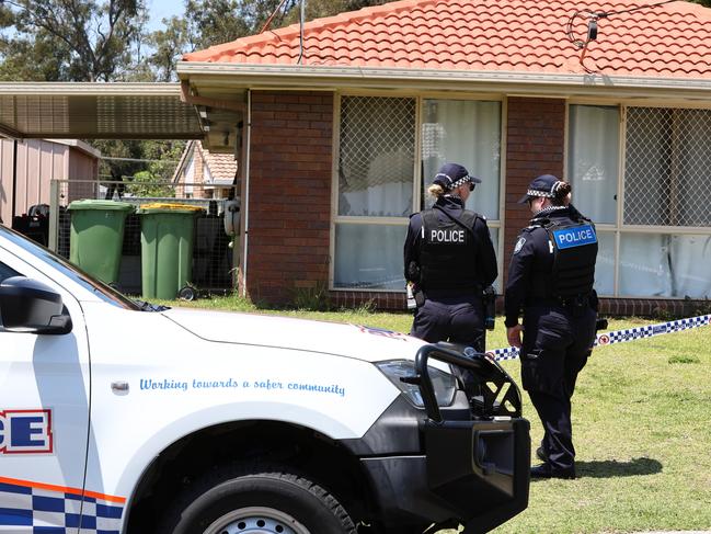 Police on scene at a Bix Court address at Crestmead where a man was shot by police. Picture: David Clark