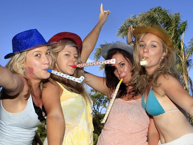 Zinia Cox , 21, Ashlee Miles, Karli Stevens, Tess Matarczyk, all 21, getting ready to party on December 31, 2010. Picture: Chris Scott