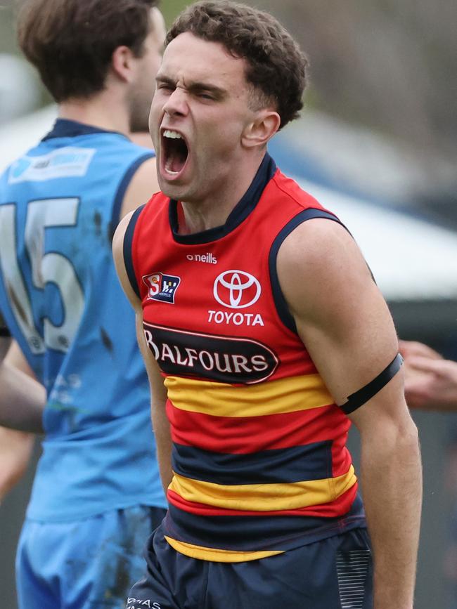 Adelaide’s Lachlan Sholl celebrates kicking a crucial goal in his side’s inspirational upset win against Sturt at Unley Oval on Saturday. Picture: David Mariuz/SANFL