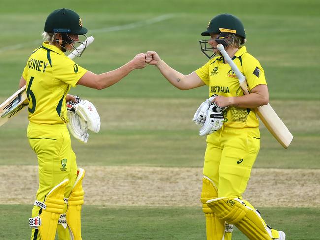 GQEBERHA, SOUTH AFRICA - FEBRUARY 16: Beth Mooney and Alyssa Healy of Australia celebrate following the ICC Women's T20 World Cup group A match between Sri Lanka and Australia at St George's Park on February 16, 2023 in Gqeberha, South Africa. (Photo by Mike Hewitt/Getty Images)