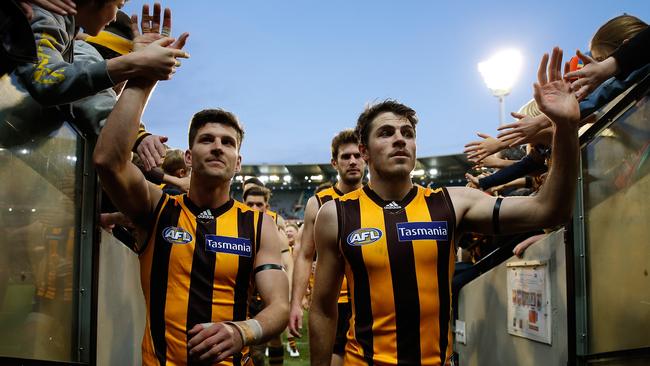 Luke Breust (left) and Isaac Smith were Hawthorn teammates but no longer. Picture: Michael Willson/AFL Media/Getty Images