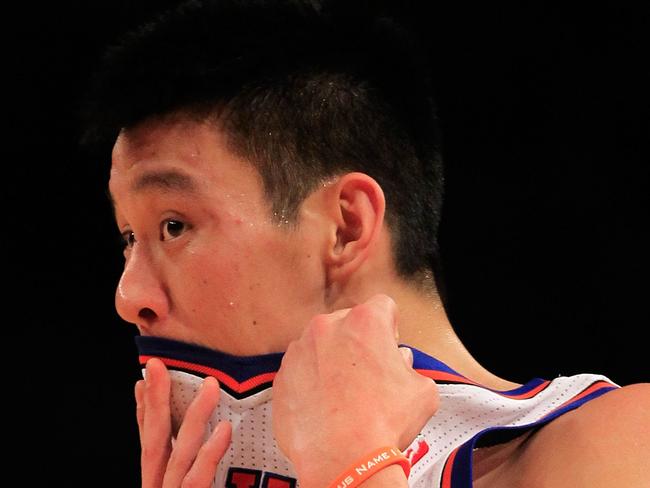 Jeremy Lin #17 of the New York Knicks looks on during the game against the New Jersey Nets at Madison Square Garden on February 20, 2012 in New York City. NOTE TO USER: User expressly acknowledges and agrees that, by downloading and/or using this Photograph, user is consenting to the terms and conditions of the Getty Images License Agreement. Chris Trotman/Getty Images/AFP== FOR NEWSPAPERS, INTERNET, TELCOS & TELEVISION USE ONLY ==