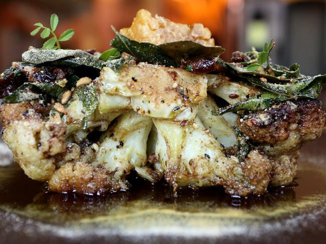 29/07/2016 A Whole roasted cauliflower with capers and medjool dates from Africola, Adelaide. Kelly Barnes/The Australian