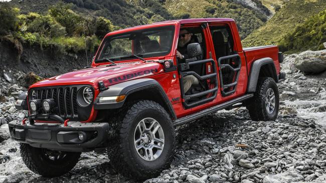 The Jeep Gladiator has removable doors and a fold down windscreen.