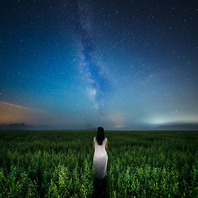 © Kimmo Kuisma, Finland, Entry, Open, Low Light, 2016 Sony World Photography Awards “I wanted to capture this long exposure image right in the middle of a dark night with the Milky Way showing. The image shows a woman walking along a path, a path which seems to lead up to the Milky Way. She may be heading to her physical home for now, but eventually we all return to our stellar origins as starstuff. My goal was to capture a portrait that displays not just the physical aspects of a person, but a portrait of her whole being as a part of a larger universe.”