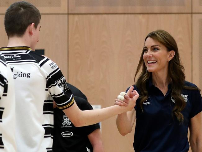 Princess Catherine was still sporting strapping on her injured fingers. Picture: AFP