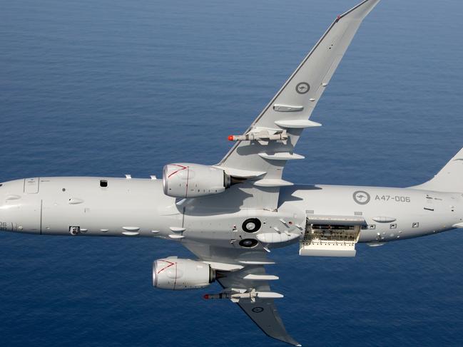 Air to Air photo of Royal Australian Air Force P-8A Poseidon with Harpoon Missiles. *** Local Caption *** Air to Air photo of Royal Australian Air Force P-8A Poseidon with Harpoon Missiles.