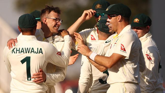 Todd Murphy of Australia celebrates taking the wicket of KL Rahul of India of India during day one of the First Test. (Photo by Robert Cianflone/Getty Images)