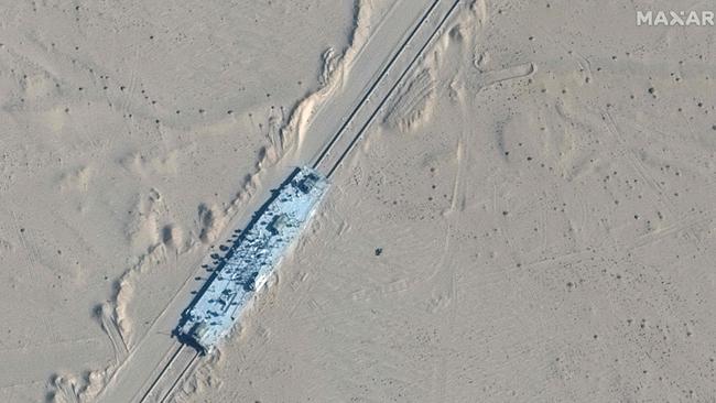 A satellite image showing a mobile target on a rail track in the Taklamakan Desert, in China's western Xinjiang region on October 20, 2021. Picture: Maxar Technologies / AFP