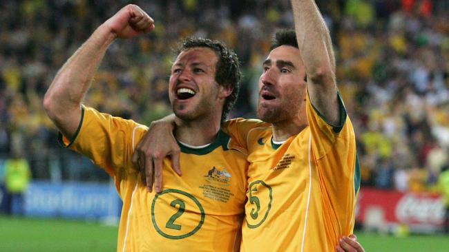 Lucas Neill (left), seen here alongside Tony Vidmar in 2006 World Cup qualifying, had a long and successful career. (Photo by Robert Cianflone/Getty Images)
