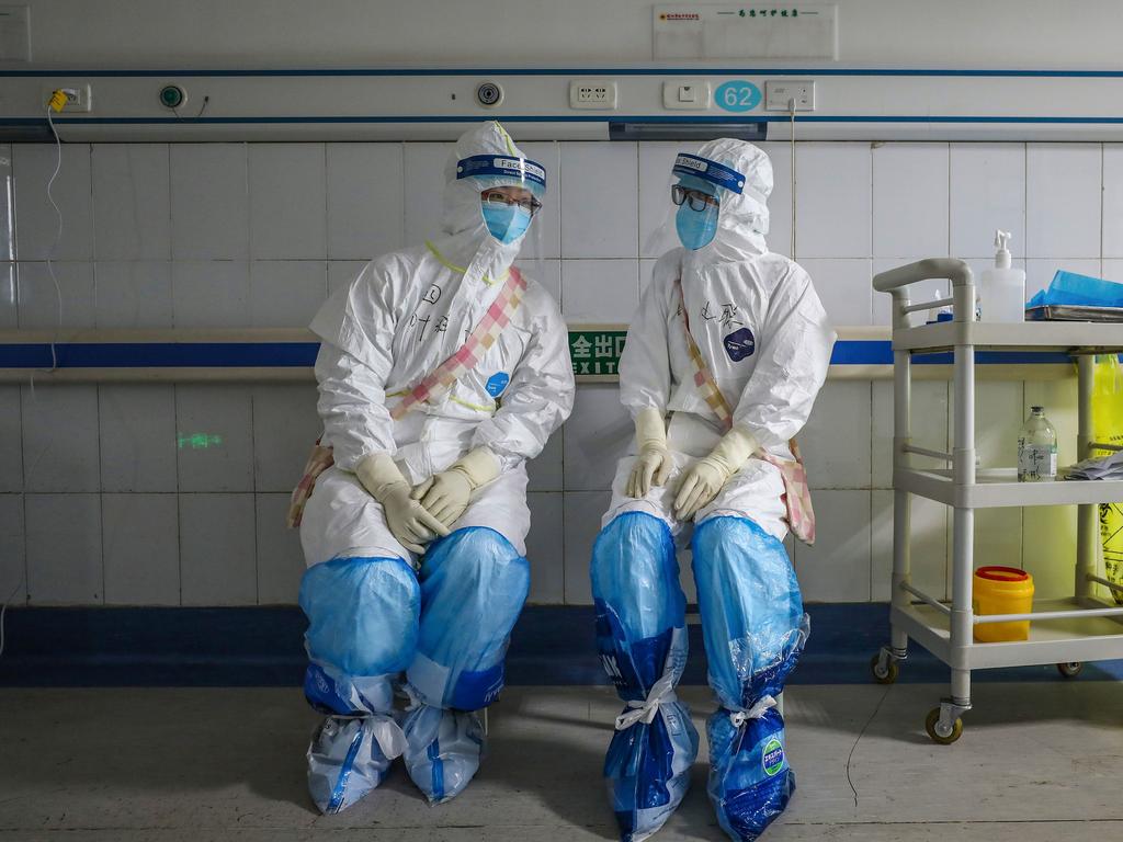 Doctors in China have begun dying of the disease. Picture: STR / AFP.