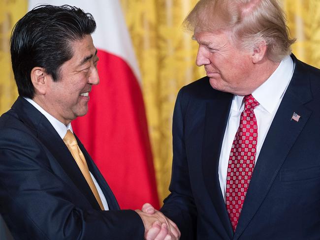 Japan's Prime Minister Shinzo Abe (left) meets US President Donald Trump at the White House. Picture: AFP/Brendan Smialowski