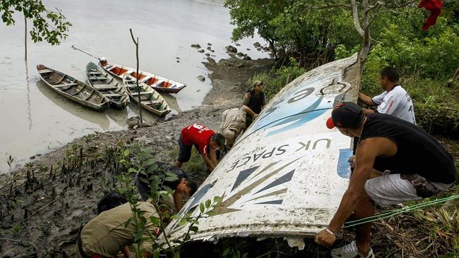 Locals club together to haul in the debris after authorities failed to believe the finding. Now, the UK has been told to come take it back. 