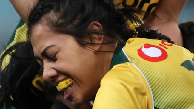 Australia's Mhicca Carter and Atasi Lafai make a tackle during the Australian Wallaroos v New Zealand Ferns Bledisloe Cup match at ANZ Stadium, Homebush. Picture: Brett Costello