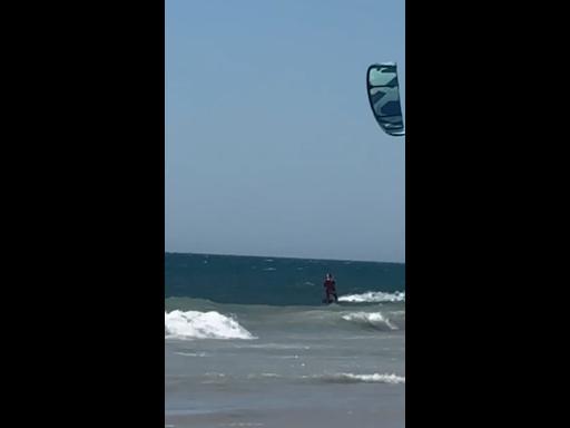 Santa spotted surfing at Western Australia beach