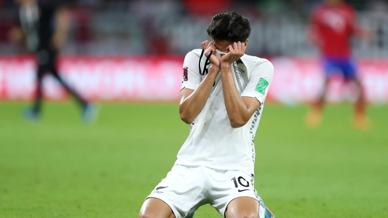 Marko Stamenic of New Zealand looks dejected following their sides defeat. Photo by Mohamed Farag/Getty Images.