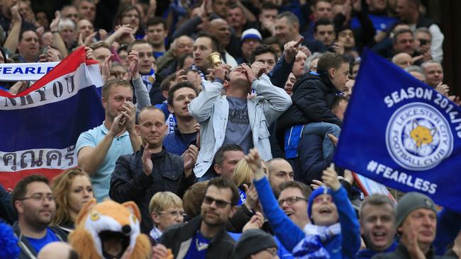 Leicester supporters celebrate.