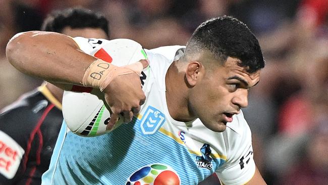 BRISBANE, AUSTRALIA - FEBRUARY 22: David Fifita of the Titans attempts to break free from the defence during the 2025 NRL Pre-Season Challenge match between Dolphins and Gold Coast Titans at Kayo Stadium on February 22, 2025 in Brisbane, Australia. (Photo by Bradley Kanaris/Getty Images)