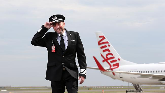 Virgin pilot Robert Ricketts is ready for takeoff as more jets are allowed on the once-busy Melbourne-Sydney air route. Picture: Jane Dempster