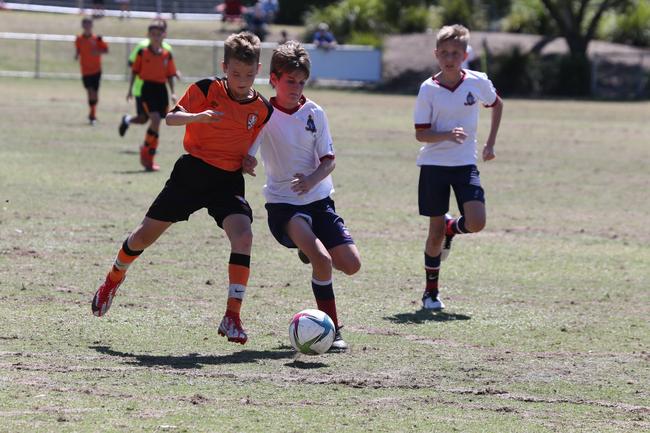 The Premier Invitational football tournament on the Gold Coast. TSS v Brisbane Roar under-13s in action. Picture: Mike Batterham.